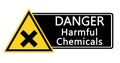 Danger harmful chemicals. Yellow triangle warning sign with symbol and text Royalty Free Stock Photo