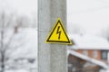 Danger high voltage warning sign on electric pole Royalty Free Stock Photo