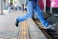 Danger,hung from a train,walking up the train in a rush hour to work,Hurry time,holiday vacation,Travel concept. Royalty Free Stock Photo