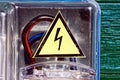 Danger label with lightning on the meter