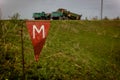 Danger of mines on field. warning Royalty Free Stock Photo