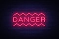 Danger Neon Text Vector. Danger neon sign, design template, modern trend design, night neon signboard, night bright Royalty Free Stock Photo