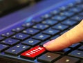 Danger online internet dark web hate crime victim user finger pressing pushing red button computer