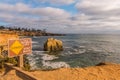 Danger Sign with Bird Rock at Sunset Cliffs Royalty Free Stock Photo