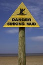 Danger sinking mud sign, sand point beach England uk