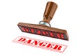 Danger stamp. Wooden stamper, seal with text danger, 3D rendering Royalty Free Stock Photo