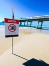 Danger swimming sign beach, red flag