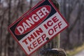 Danger thin ice sign on post Royalty Free Stock Photo