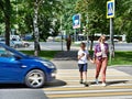 Danger of using smartphone by pedestrians on road Royalty Free Stock Photo