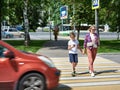 Danger of using smartphone by pedestrians on road Royalty Free Stock Photo