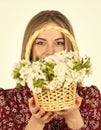 Danger in a vase. womens and mothers day. girl at flower shop. natural holiday gift. happy woman carry flowers in basket