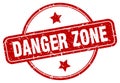 danger zone stamp. danger zone round vintage grunge label. Royalty Free Stock Photo