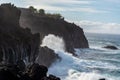 Dangerious ocean stormy waves hits black lava rocks on La Palma island, Canary, Spain Royalty Free Stock Photo