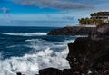 Dangerious ocean stormy waves hits black lava rocks on La Palma island, Canary, Spain Royalty Free Stock Photo