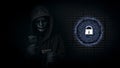 Dangerous anonymous hacker man in hooded and mask use smartphone and credit card, break security data and hack password with key