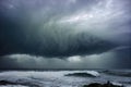 Dangerous approaching storm over sea or ocean coast natural disaster background with broken wavy foamy water surface