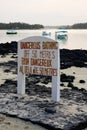 Dangerous Bathing Sign at Blue Bay, Mauritius Royalty Free Stock Photo