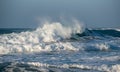 Dangerous big stormy waves during a windstorm at the sea Royalty Free Stock Photo
