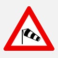 Dangerous crosswinds red road sign Royalty Free Stock Photo