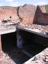 Dangerous, destroyed Foundation in the sewer underground sinkhole in the basement pit