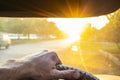 Dangerous driving with blinding sun in the car windshield.background blurred with bokeh effect Royalty Free Stock Photo