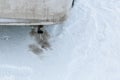 Dangerous freezing of the exhaust pipe of the car in extreme cold during long parking and heating of the passenger compartment Royalty Free Stock Photo