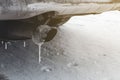 Dangerous freezing of the exhaust pipe of the car in extreme cold during long parking and heating of the passenger compartment Royalty Free Stock Photo