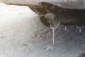 dangerous freezing of the exhaust pipe of the car in extreme cold during long parking and heating of the passenger compartment Royalty Free Stock Photo