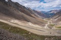 Dangerous gravel mountain road to Kumtor gold mine. Serpentine road to Barskoon mountain pass. Travel, tourism in Kyrgyzstan