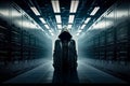 Dangerous hacker penetration tester engineer standing in a digital technology datacenter server room.