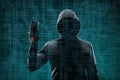 Dangerous hacker with a smartphone gadget over digital background with binary code. Obscured dark face in mask and hood Royalty Free Stock Photo