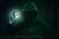 Dangerous hacker stealing data over screen with binary code.