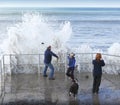 Family caught out by large wave Royalty Free Stock Photo