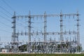 Dangerous High Voltage Electrical Power Substation against cloudless blue sky IX Royalty Free Stock Photo