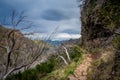 Dangerous hiking path at the mountains of Madeira island. Royalty Free Stock Photo