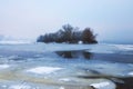 Dangerous hobby-winter fishing. Dnipro River was covered with first thin ice but the lovers of winter fishing are already fishing Royalty Free Stock Photo