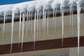 Dangerous icicles. Fines for snow and ice on roofs.