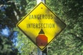 Dangerous intersection road sign