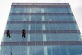 Dangerous jobs, skyscraper cleaners descend with mountaineer`s ropes