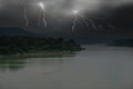 Dangerous lightning with black monsoon clouds cover the earth