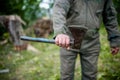 Dangerous man holding an custom made steel, sharp axe Royalty Free Stock Photo