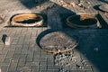 Dangerous opened manhole hole cover. Construction work Royalty Free Stock Photo