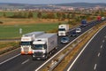 Dangerous overtaking of two trucks