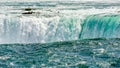 Dangerous rapids falling over edge into waterfall