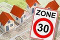 From dangerous road for cars to safe road for people - concept with zone 30 road sign, Royalty Free Stock Photo