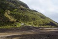 Dangerous road on hill with many curves and inclination in volcanic area