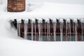 Dangerous sharp icicles and snow hanging from the roof