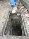 Dangerous situation when a man nearly fall into a drain