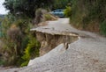 Undermined road after landslide Royalty Free Stock Photo