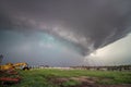A dangerous supercell storm emits a blue green glow in the sky. Royalty Free Stock Photo